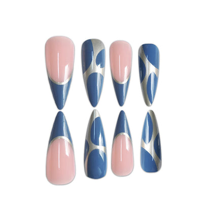 Artistic Stiletto Press-On Nail Design with Metallic Trim Acalora