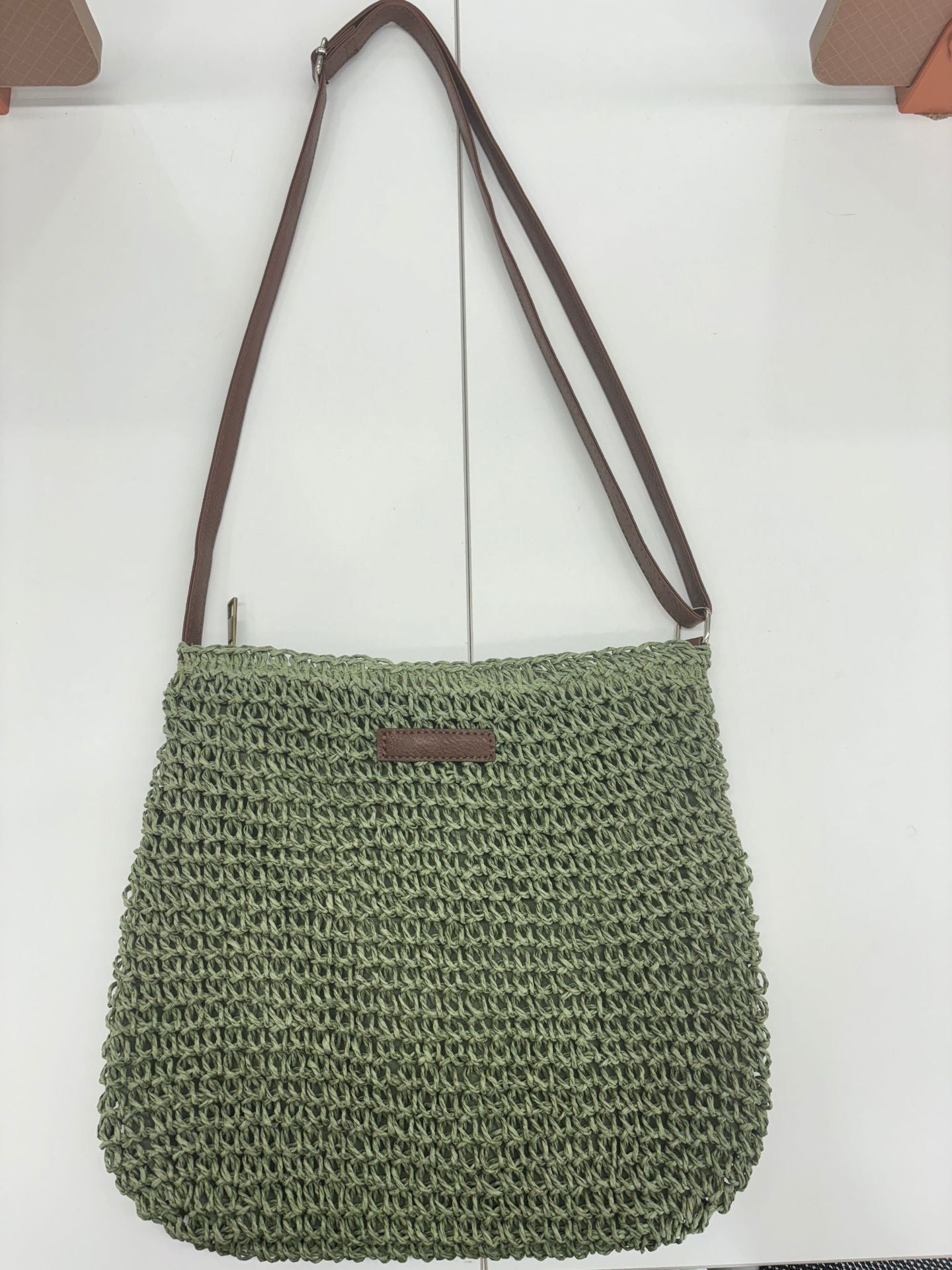 Handwoven shoulder bag with brown leather accent Skanto