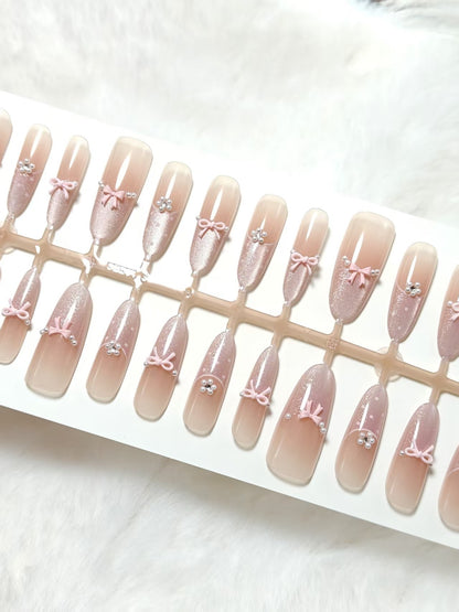 Artificial nails with elegant glitter and bow design Acalora