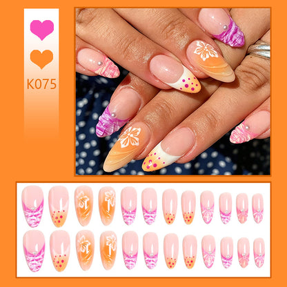 Acrylic nail set with exotic flower patterns and glitter accents Acalora