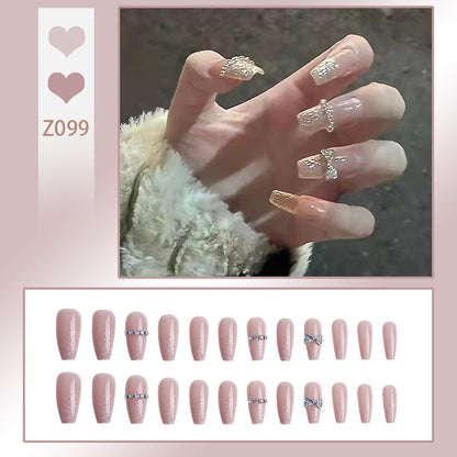 Glamorous artificial nails with sparkling rhinestone and glitter elements Acalora