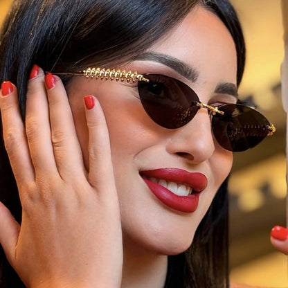 Women's sunglasses in a modern, geometric design with a stylish metal frame and UV protection Karnz