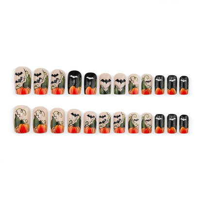 Artificial nails in Halloween design with pumpkins and ghosts Acalora