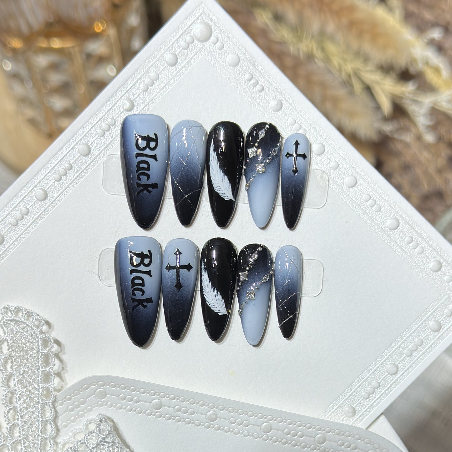 Artistic Press-On Nail Set with Gothic Feather and Cross Design Acalora