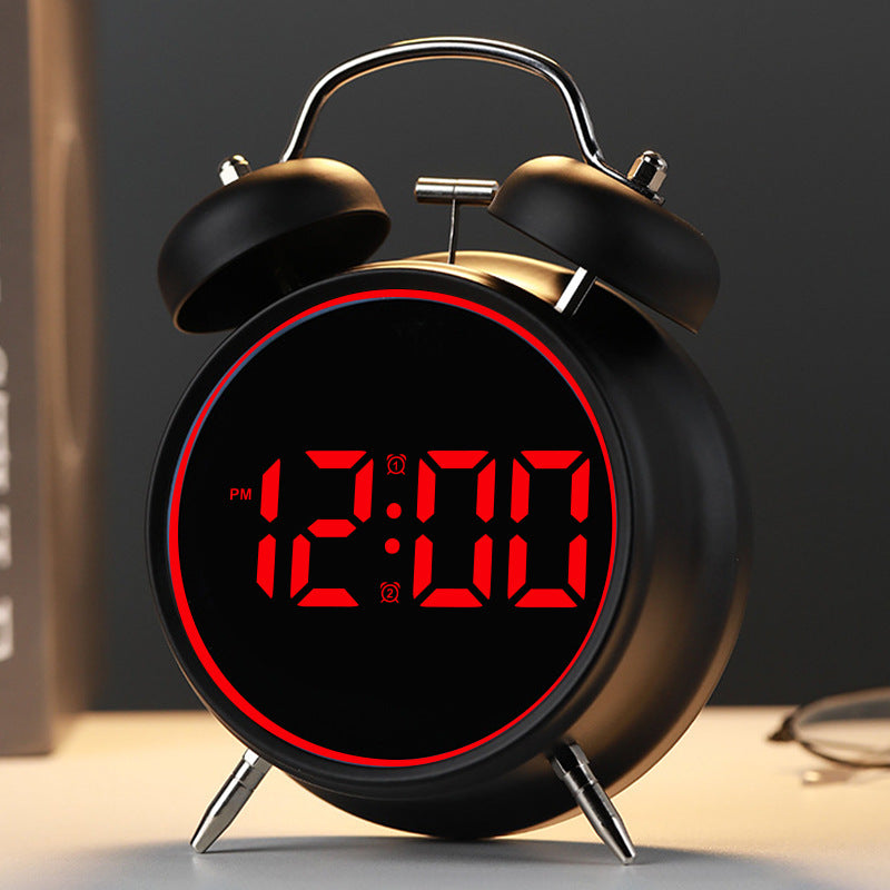 Digital alarm clock with alarm and temperature display