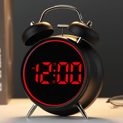 Digital alarm clock with alarm and temperature display