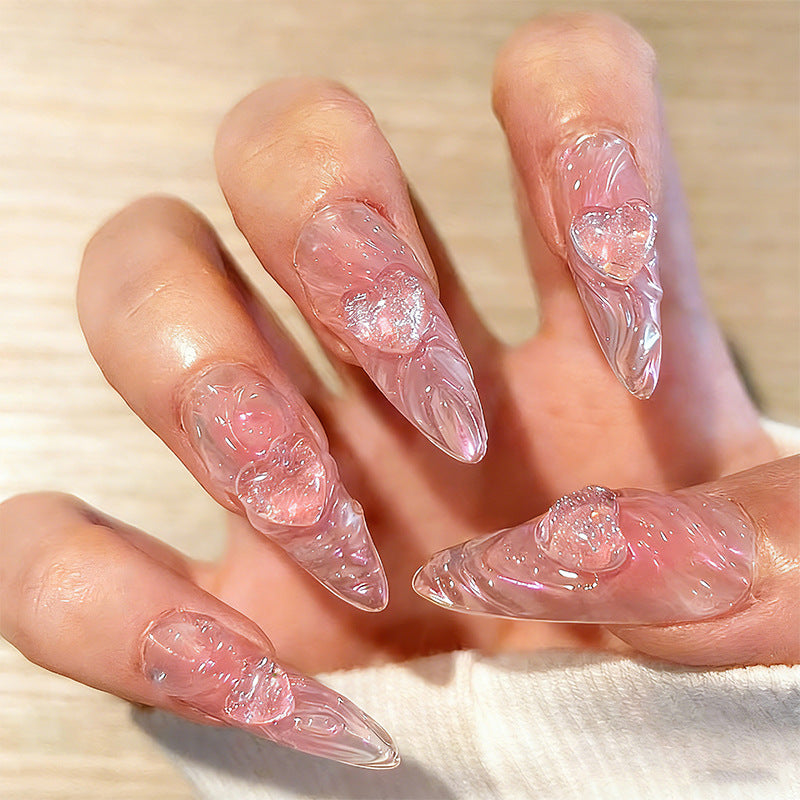 Artificial nail set with 3D heart decorations and shimmering accents Acalora