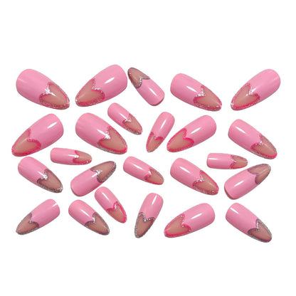 Art nails with heart design and glitter accents Acalora