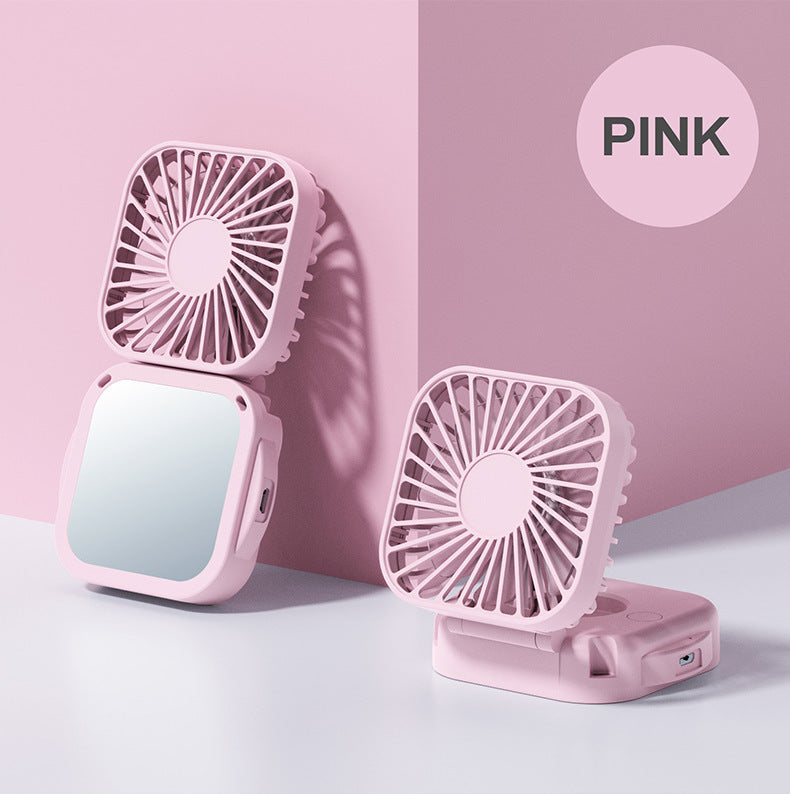 Unisex nan compact foldable clip on handheld desk fan with built in mirror adjustable tilt and USB rechargeable battery Bowlift