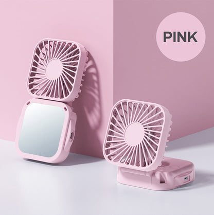 Unisex nan compact foldable clip on handheld desk fan with built in mirror adjustable tilt and USB rechargeable battery Bowlift