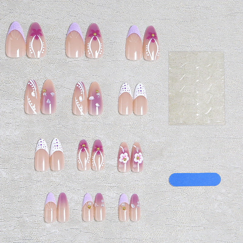 Artificial nail set with exotic floral and glitter accents Acalora