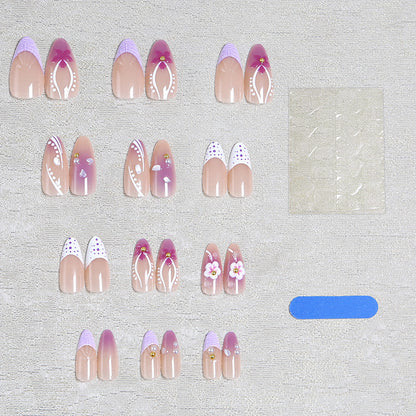 Artificial nail set with exotic floral and glitter accents Acalora