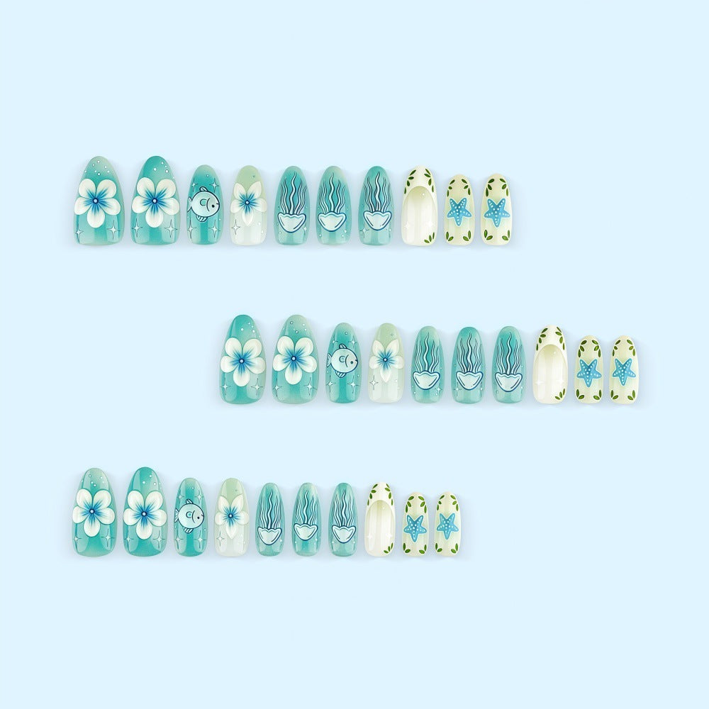 Artificial nails in a maritime design with colorful shell and water motifs Acalora