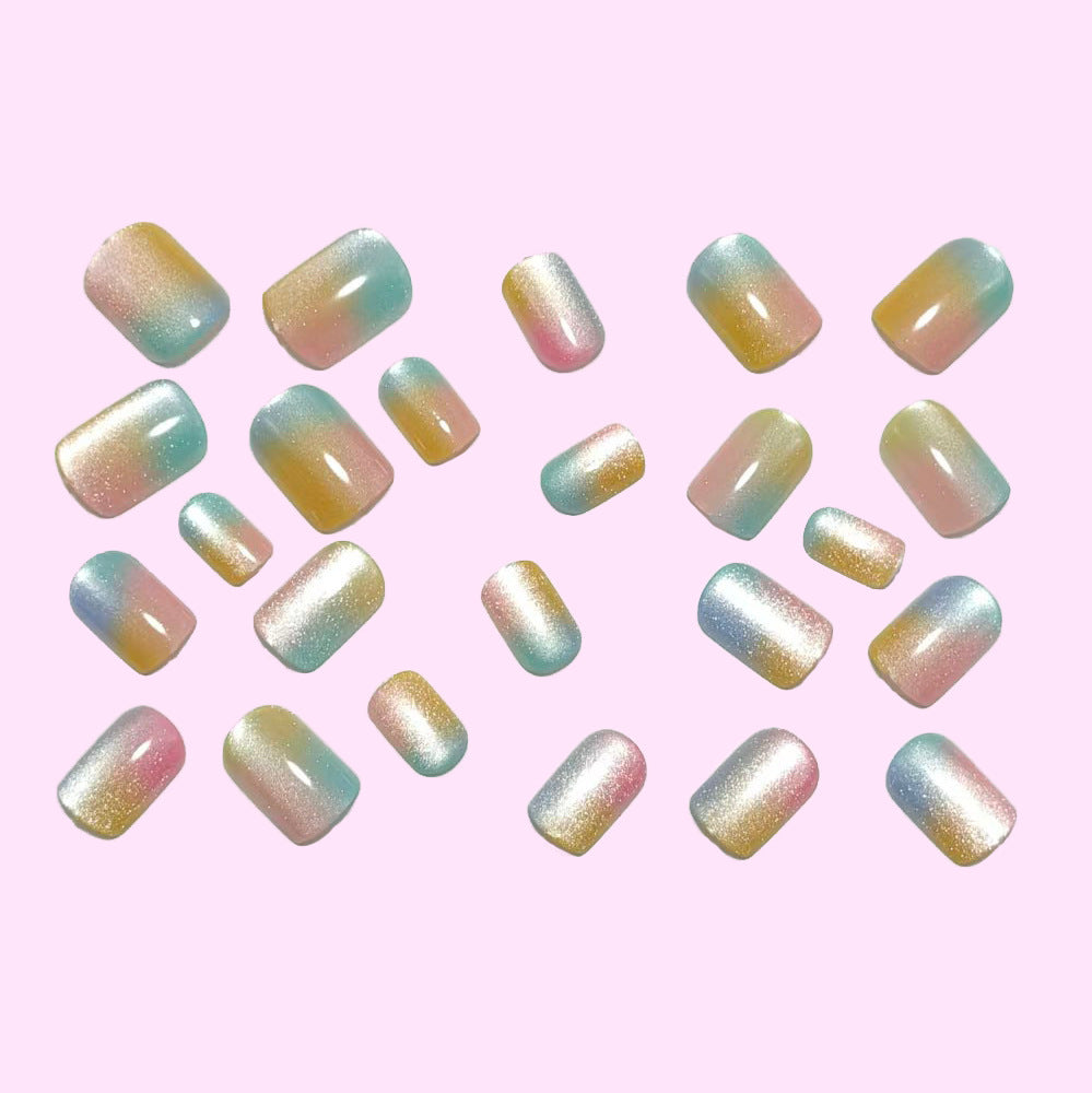 Artificial nails in delicate ombre design with glitter effects Acalora