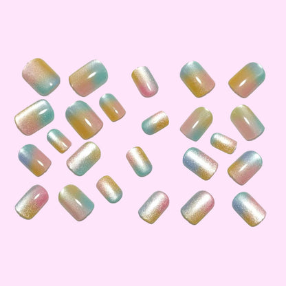 Artificial nails in delicate ombre design with glitter effects Acalora