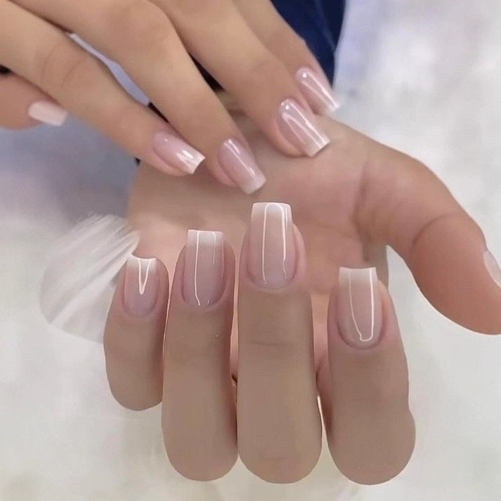 Artificial nails in elegant French tip design Acalora