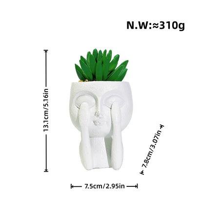 Plant pot with face motif Acalora