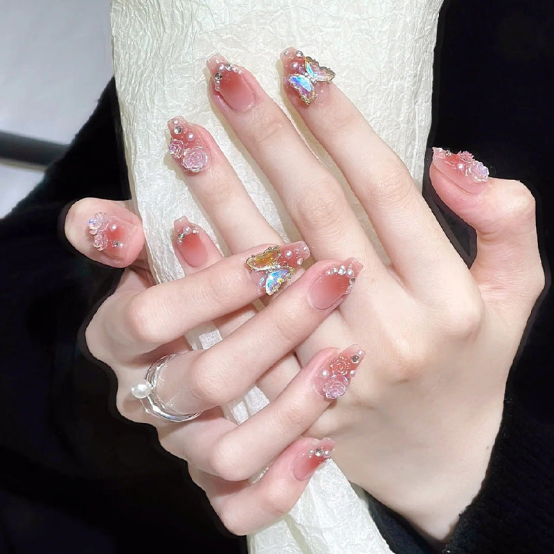 Artificial nail set with filigree 3D flowers and radiant glitter accents Acalora