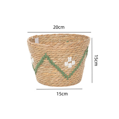 Handwoven storage basket with colorful accents Acalora