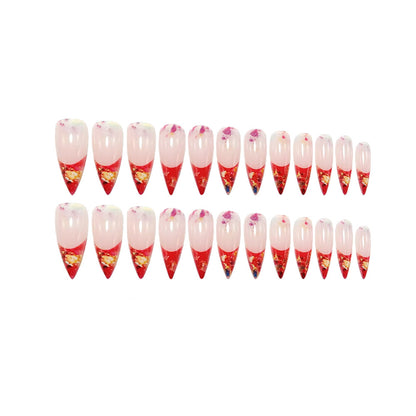 Nail art with sparkling design and extravagant pointed tips Acalora