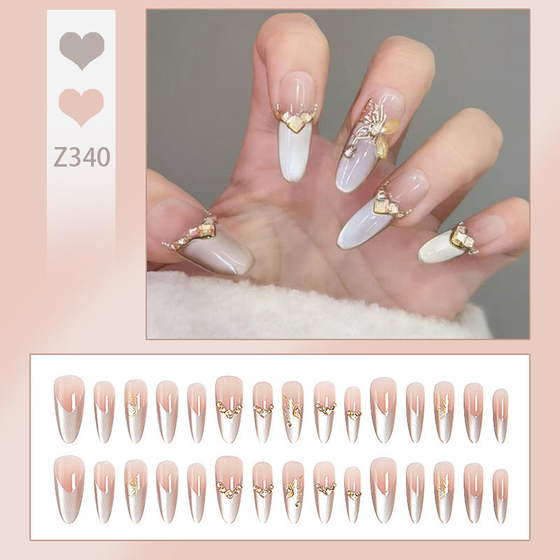 Glamorous art nails with elegant golden details Acalora