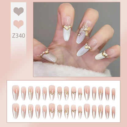 Glamorous art nails with elegant golden details Acalora