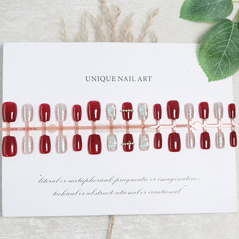 Glamorous artificial nail set with sparkling 3D applications and elegant embellishments Acalora