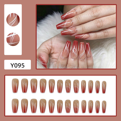 Artificial nails in elegant ombre design with fine lines Acalora