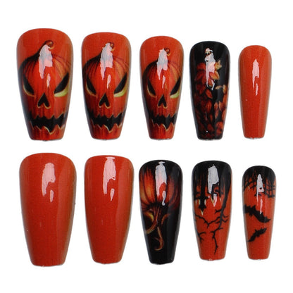 Creative nail art set with Halloween motif and glowing design Acalora