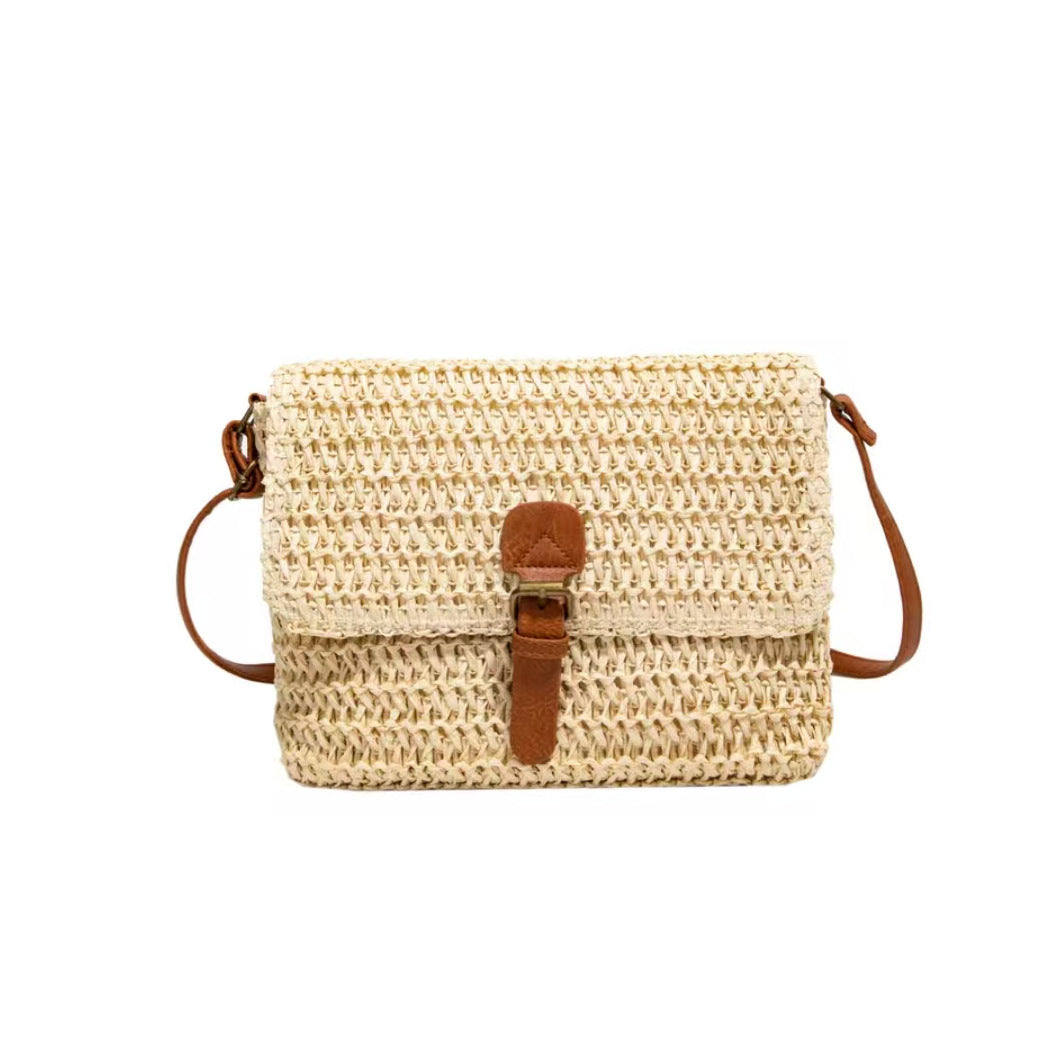 Handbag made of woven natural material with leather accents Bowlift