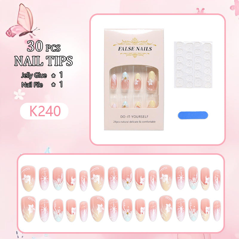 Artificial nail set with intricately detailed floral designs and shine accents Acalora