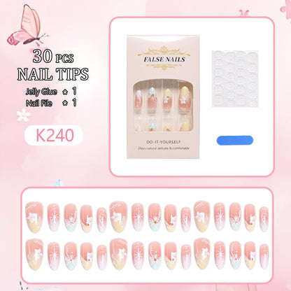 Artificial nail set with intricately detailed floral designs and shine accents Acalora