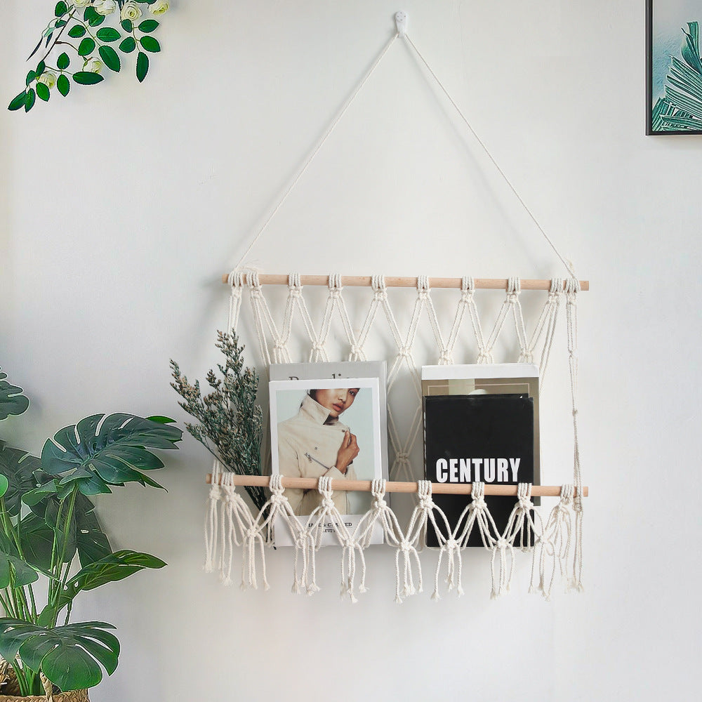 Elegant macramé wall hanging with decorative tassels and wooden frame
