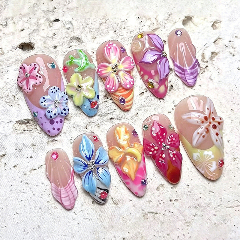 Artificial nail set with blooming 3D flower accents Acalora