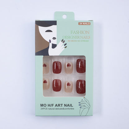 Art nail set with heart designs and glitter Acalora
