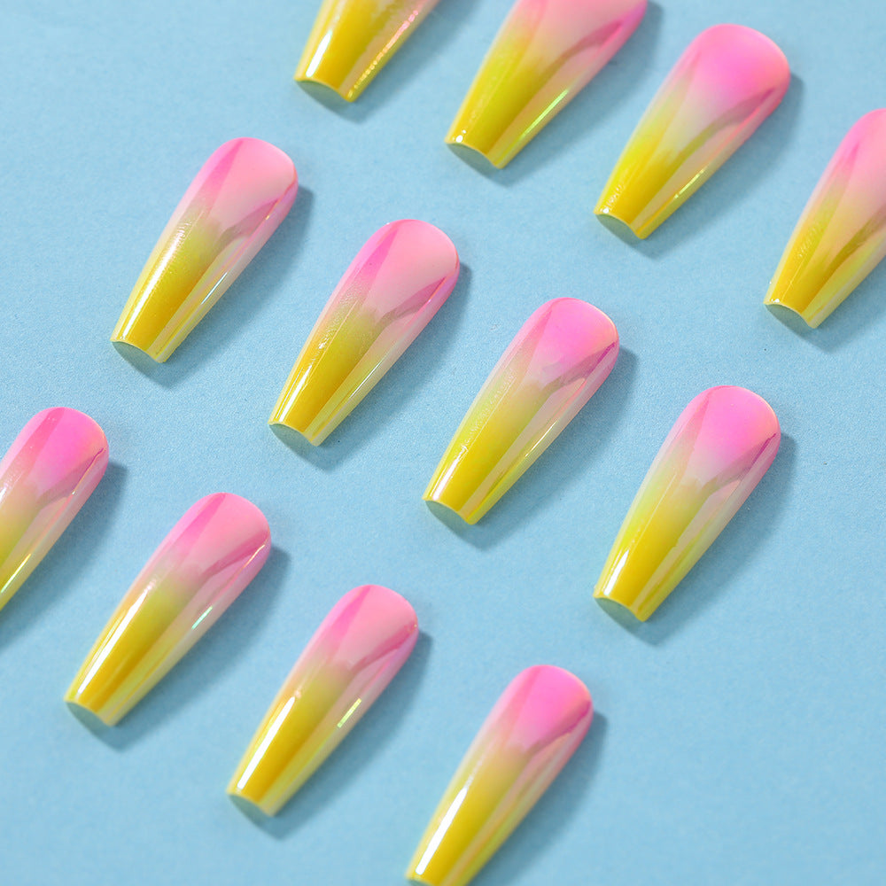 Artificial nail tips in modern ombre design Acalora