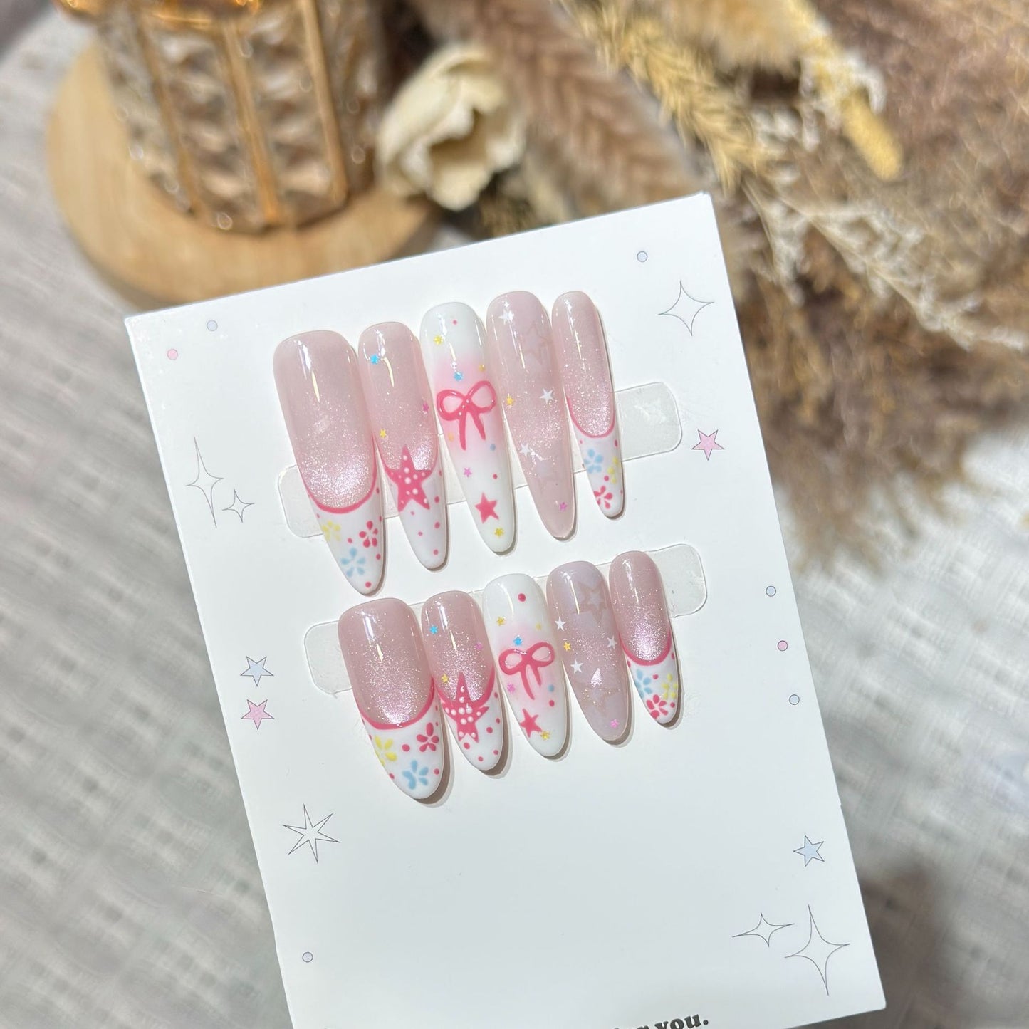 Artistic Press-On Nail Art Set with Charming Star and Bow Designs Acalora