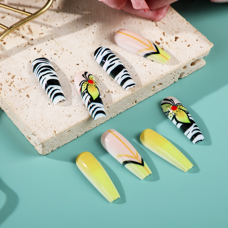 Creative press-on nails with flower and animal designs Acalora