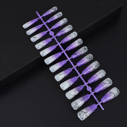 Artificial nails in modern ombre design with marbled accents Acalora