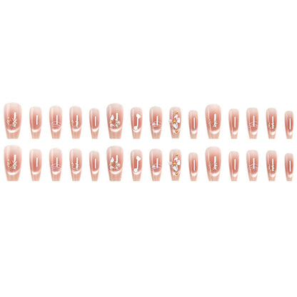 Artificial nail set with elegant glitter and flower decorations Acalora