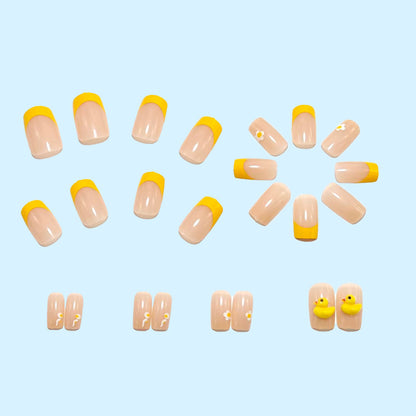 Artificial nails with playful duck motif and spring accents Acalora