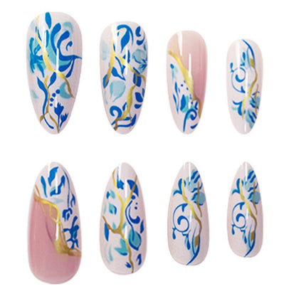 Artistic Floral Press-On Nail Design with Gold Accents Acalora