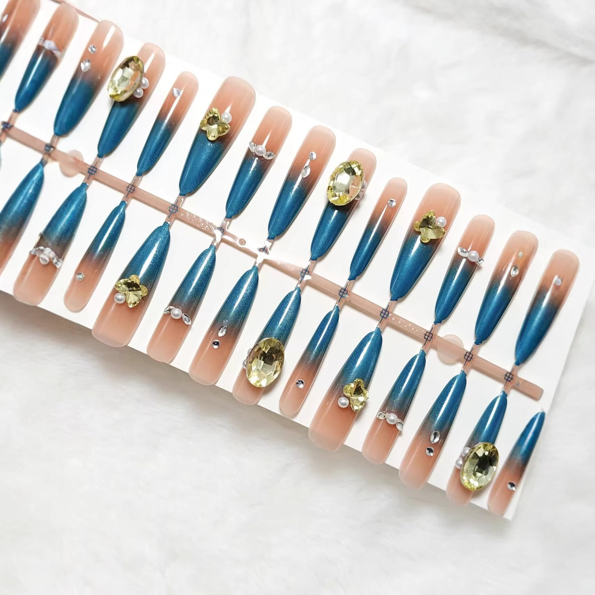 Artificial nails with glamorous stone applications Acalora