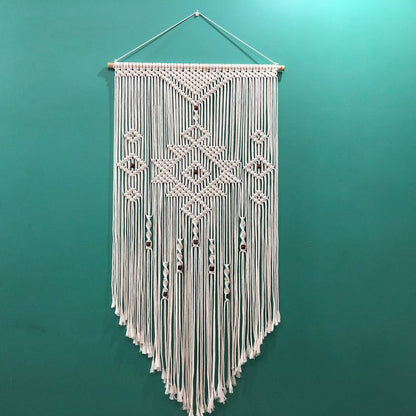 Macramé wall decoration with creative fringes