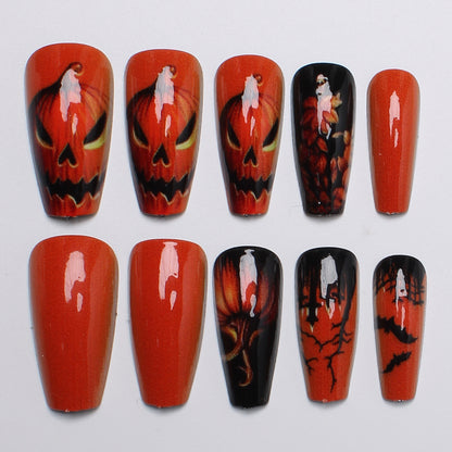 Creative nail art set with Halloween motif and glowing design Acalora