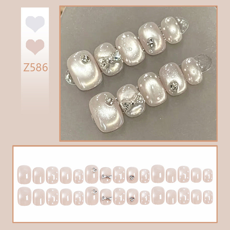 Artificial nail set with elegant glitter and crystal decorations Acalora