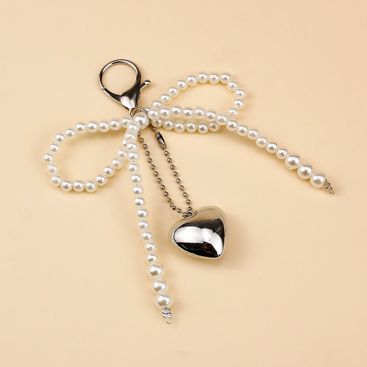 Elegant Pearl Bow Brooch Acalora