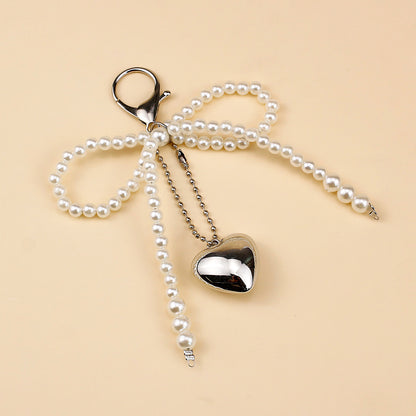 Elegant Pearl Bow Brooch Acalora