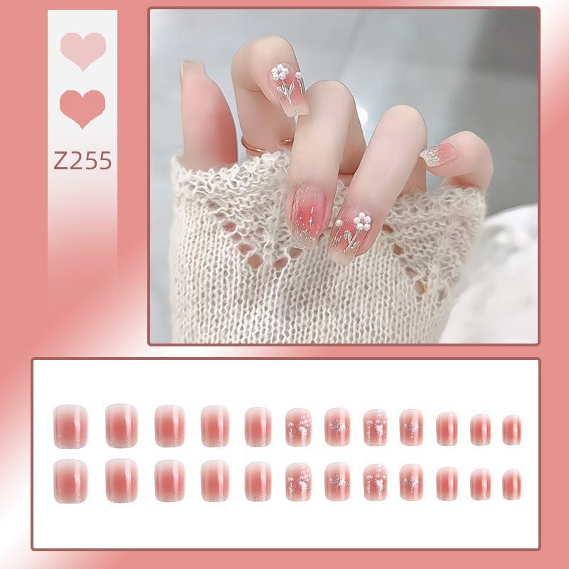 Artificial nail set with floral designs and glitter accents Acalora