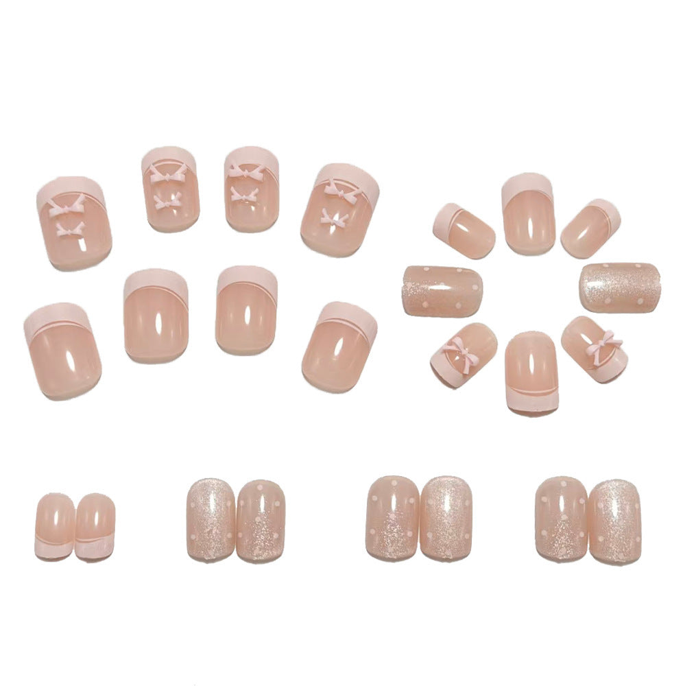 Artificial nails with delicate bow and glitter motifs Acalora